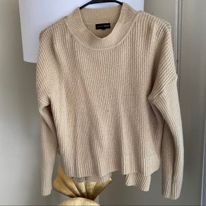 High neck light weight sweater.